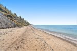 Your private beach awaits your laughter.
