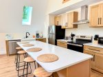 A bright, modern kitchen with everything you need for easy meals and memorable mornings.