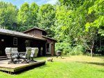 Room to roam for kids and pups alike, this fully fenced backyard is ideal for family games, furry companions, and fireside nights under the trees.