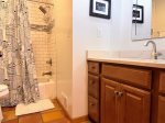 Step into your skyline soak, this updated bath combines modern finishes with a dash of big city whimsy.