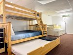 Colorful, comfy, and kid-approved. The basement bunk room sleeps a crowd and adds a little extra cheer while its at it.