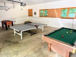 Let the tournaments begin This stocked game room has ping pong, foosball, darts, and billiards for nonstop family fun.