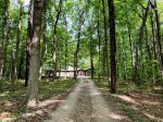 Follow the wooded lane to your private retreat. Peace, quiet, and nature await just minutes from town.
