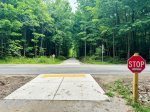 Lace up your sneakers or hop on your bike for an easy, scenic adventure through the woods. Nature lovers and active families will love having this trail right nearby.