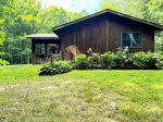 Flanked by hydrangeas and surrounded by trees, Wildhaus blends quietly into its natural setting welcoming guests with color, calm, and comfort.
