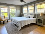 This second-floor king suite features an en suite bath, loads of natural light, and a vibe that says sleep in youre on vacation.
