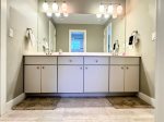 This spacious vanity in the Jack and Jill bath makes mornings smooth for couples, siblings, or friends sharing the space.