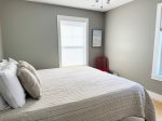 This second king bedroom keeps it minimal and serenewith just enough personality to make it feel like home.