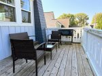 Low-key, lake-town living. A little sun, a little shade, and a big breath of fresh air this third-floor perch is peak vacation mode.