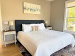 Soft tones, golden light, and space to breathe. The third-floor king suite is a quiet hideaway with its own ensuite and a calming coastal vibe.