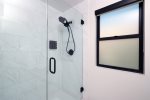 Large shower in the spacious bathroom