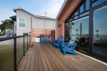 Step outside onto your private deck to enjoy views of the rock and harbor beyond