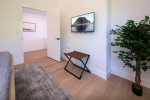 Bedroom also features a flat screen tv