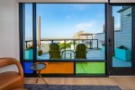 Step outside onto your private deck to enjoy views of the rock and harbor beyond