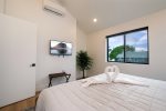 Bedroom also features a flat screen tv