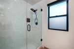 Large shower in the spacious bathroom