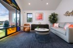 Living room features a queen sized sleeper sofa for additional sleeping space