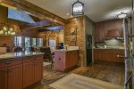 Large open kitchen adjacent to living room and dinning 