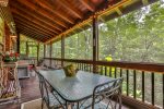 Outdoor dining on screened in porch