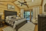 Master king bedroom with private bath, 42` TV, and deck access