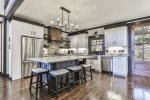 Kitchen area breakfast bar seating for three 