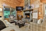 Enjoy R&R By The Stacked Stone Fireplace 