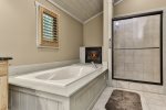 Offering A Walk In Shower & Soaking Tub