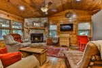 Open Living Room Space With A Gas Burning Fireplace 