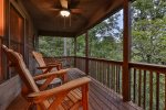 Comfy Seating On The Covered Porch To Listen To The River