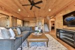 Lower Level Living Area With 65 Smart TV