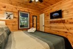 Main Level King Bedroom With TV