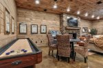 Lower Level Entertainment Area With Gas Fireplace, TV, Pool Table, Shuffle Board, Wet Bar  More 