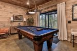 Enjoy A Round Of Fun At The Billiards Table  