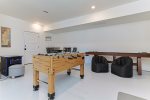 Game Room With Shuffle Board, Pac Man, Foosball  Board Games 