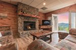 Lower Level Living Room With TV & Gas Fireplace 