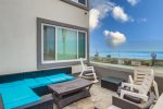 Mermaids Penthouse Patio facing Ocean with privacy glass