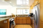 Fully loaded kitchen with stainless steal appliances and necessities.