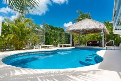 Aqua Vista ~ Tropical Florida Keys vacation home with pool and Tiki hut