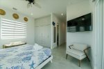 3rd level king bedroom master suite with shared balcony overlooking the pool and open water.