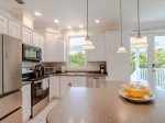 Modern full kitchen with a spacious center island.