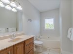 Master full bathroom with a bath tub.