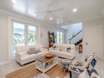 Cozy living room retreat with a sofa and a smart TV.