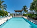 Large pool with pool side cabana.