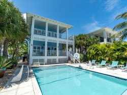 Tranquil Tides ~ Pool Home in Coco Plum Close to the Atlantic, 75' Boat Dock!