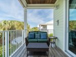 Enjoy serene moments on your private porch, where every view feels like a peaceful escape.