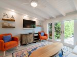 Living area flooded with natural light.