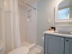 Main level bedroom with Workstation and TV with Ensuite Bathroom.