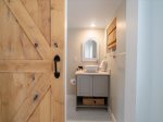 Main level bedroom with Workstation and TV with Ensuite Bathroom.