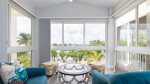 Master bedroom sitting area with peek-a-boo marina view