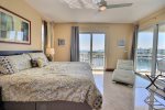 Master bedroom with king bed and marina to ocean view